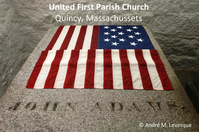 Why is the tomb of U.S. President John Adams draped with a flag with 15 stars and 15 stripes?